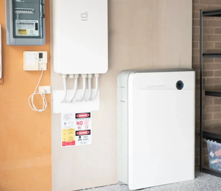 Sigenergy battery installed beside the switchboard in a garage